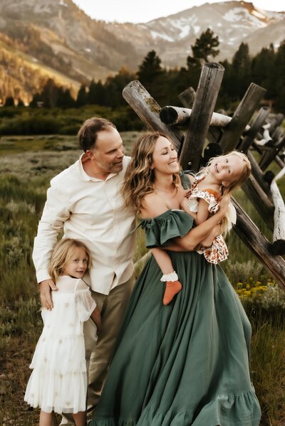 Family in beautiful coordinated outfits in Olympic Valley Park.