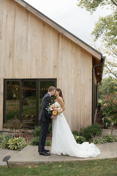 bride and groom embracing on elopement day