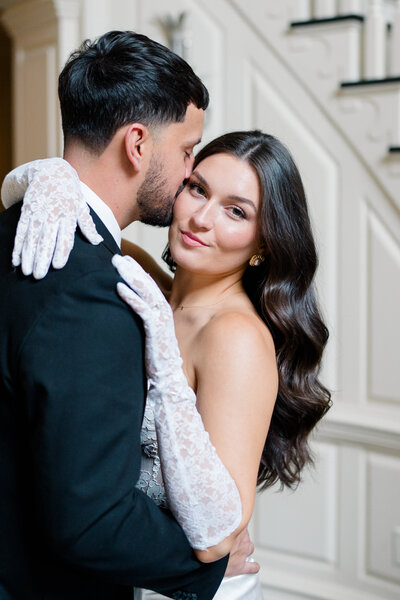 Newport Wedding Photographer | Rhode Island Caprio Captured Photography | Couple Sitting At A Sailboat Looking At The Ocean