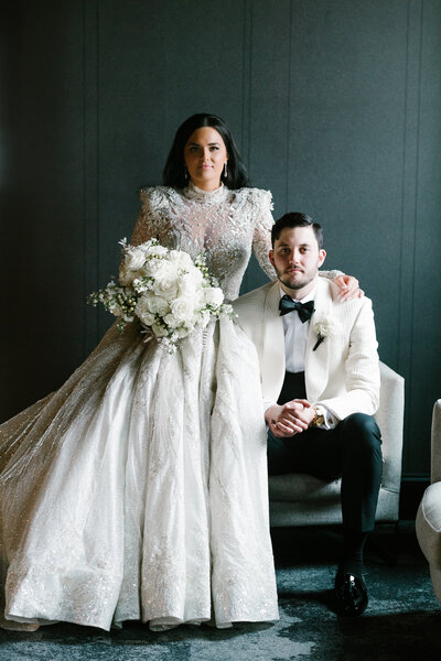 Bride sitting next to her Groom