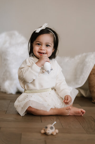 Newborn baby held by his Daddy in an Ickenham Photo Studio