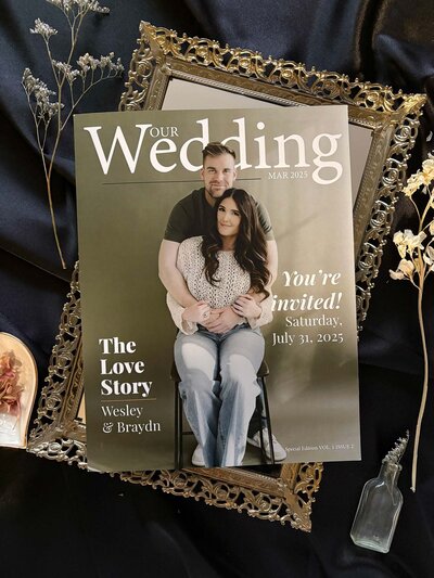 Sage green magazine wedding invitation flatlay 