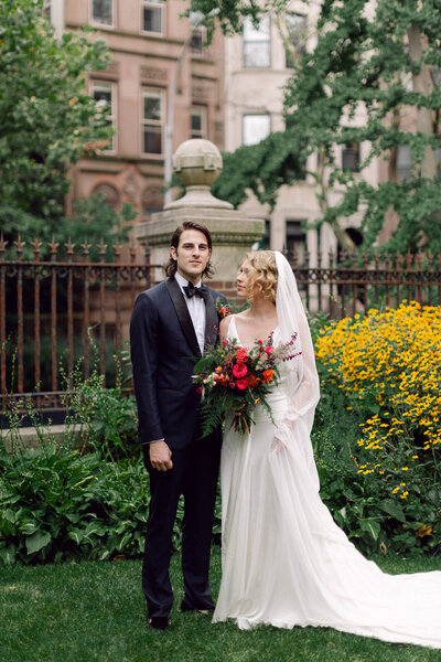 Bride lovingly gazing at the groom during their New York City wedding ceremony