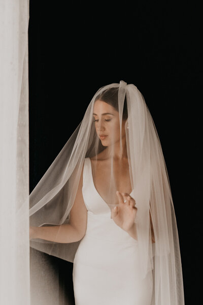 Elegant contemporary bridal portrait by Ash MacLean, featured on Bronte Bride, showcasing beautiful wedding inspiration, real local couples, and amazing Canadian Wedding Vendors.