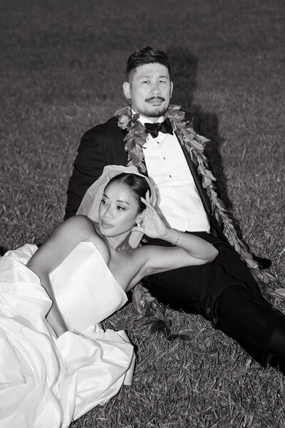 Oahu wedding photographer capturing a bride and groom at sunset