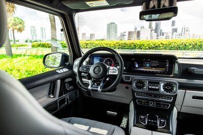 mercedes-g63-china-blue-for-rent-in-miami-driver-cockpit-dashboard-steering-wheel-view018