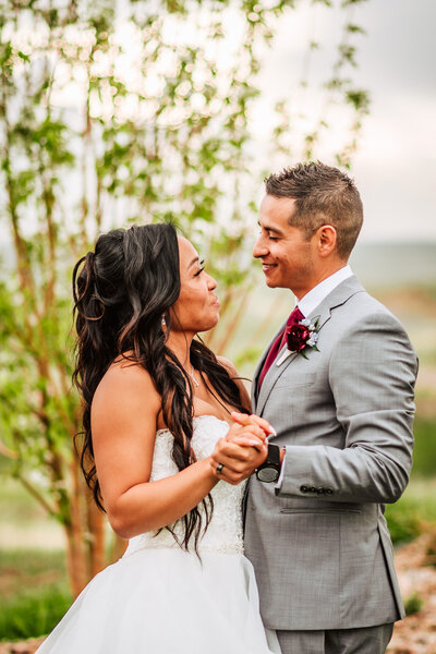 Ashley and Danny dancing in an outdoor area