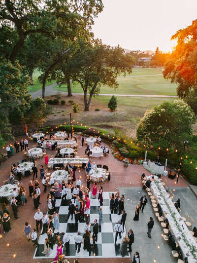 drone photo looking at dance floor at silverado resort at golden hour