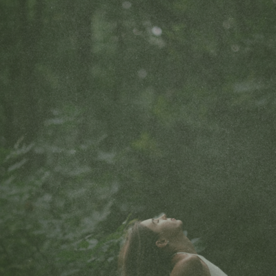 woman in nature, healing in nature, somatic massage therapist based in denver, colorado