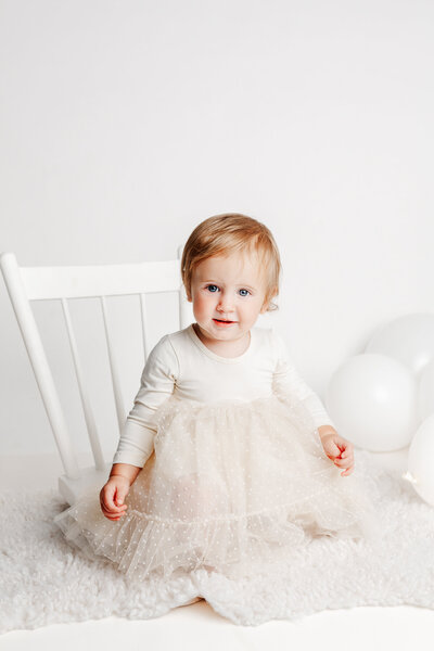 cake smash with floral backdrop