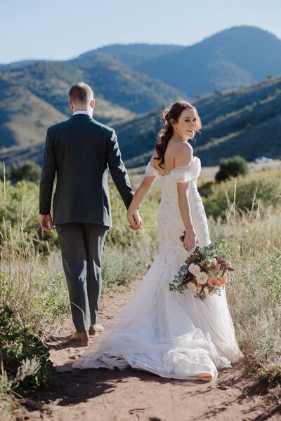 Wedding and Elopement Photography, Bride and groom  share first kiss during Colorado elopement.