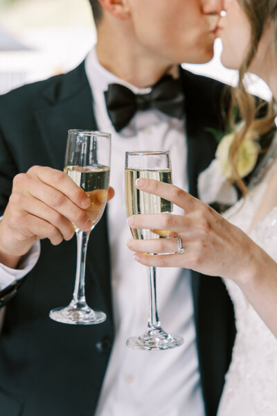Bride and groom share a toast with natural light and romantic details | Fresno wedding photographer
