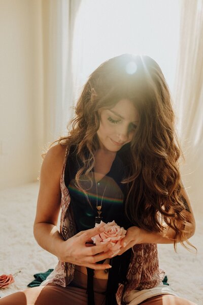 Luna Skye holding flower