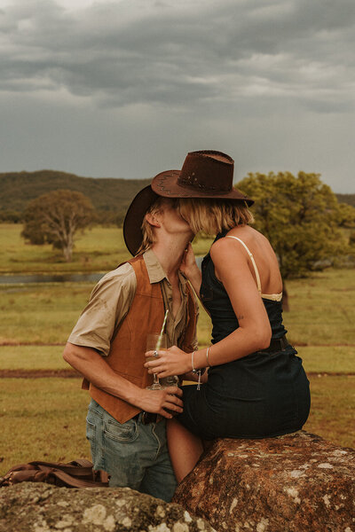 Brisbane photographer capturing a quiet, reflective moment during a branding session, filled with warmth and softness.