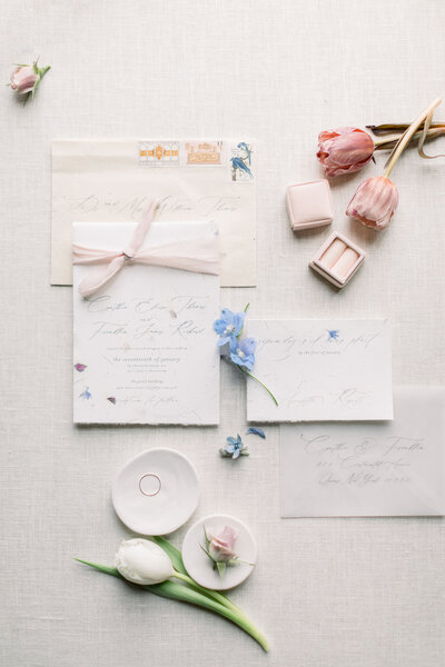 peach wedding invitation with calligraphy