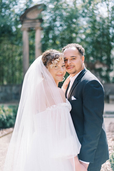 bride and groom cheek to cheek on wedding day at Swan House in Tampa