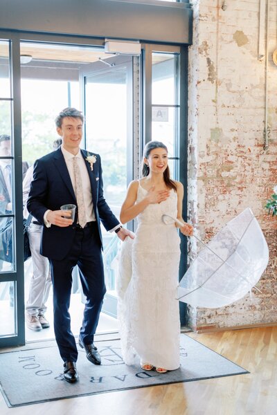 couple walking into their wedding reception