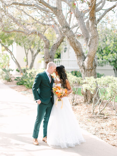 Couple portrait outdoors before ceremonny