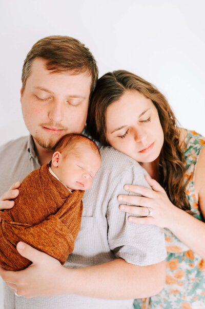 framed photo collage of maternity and newborn photos from Springfield MO newborn photographer Jessica Kennedy of The XO Photography