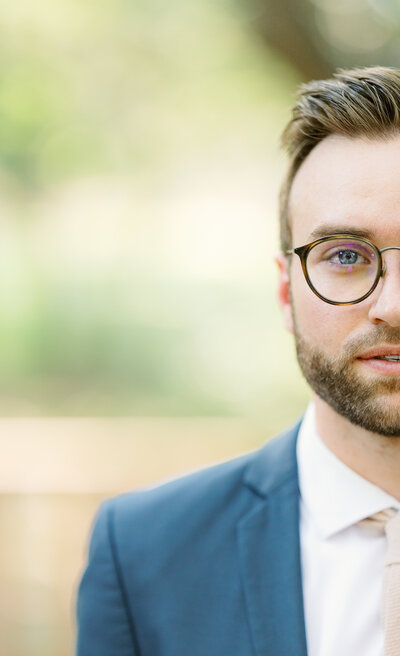 groom looking at camera