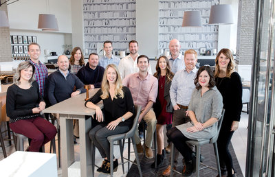 Group photo of corporate team in Denver, Colorado