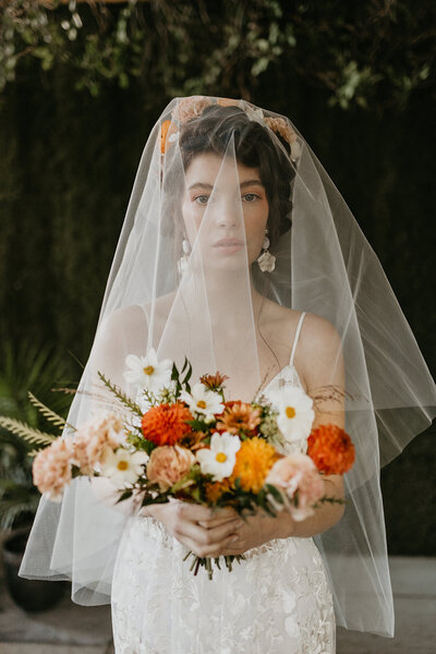 Eerie editorial alter egos and bold fashion captured by Nikki Collette Photography, adventurous and romantic wedding photographer in Red Deer, Alberta. Featured on the Bronte Bride Blog.