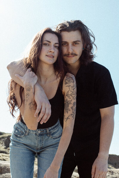 couple leaning on each other