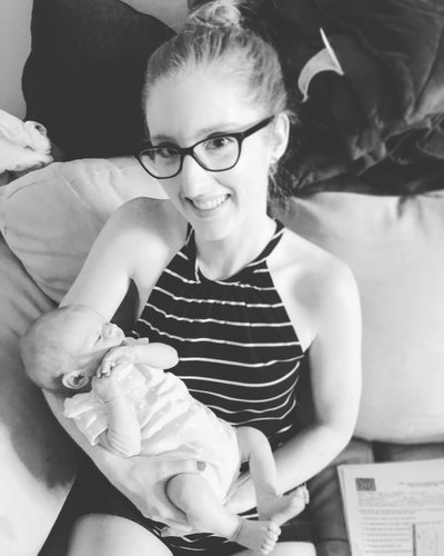 Baillie McArthur holding one of her newborn doula babies