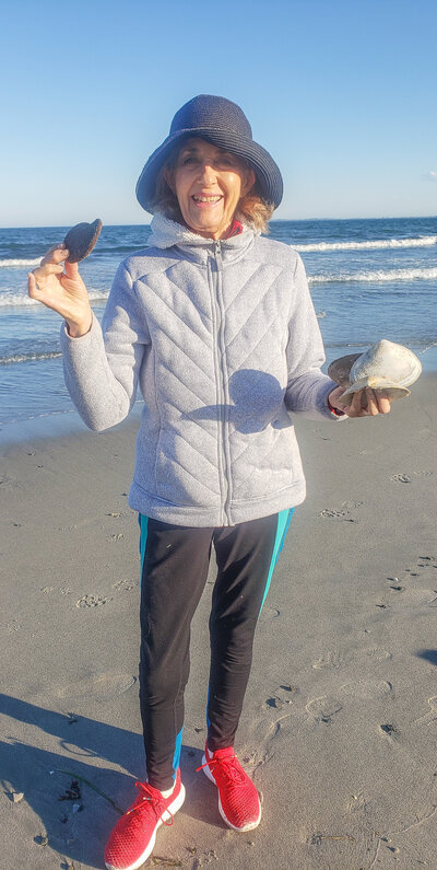 Livia optimizing her brain at the beach.