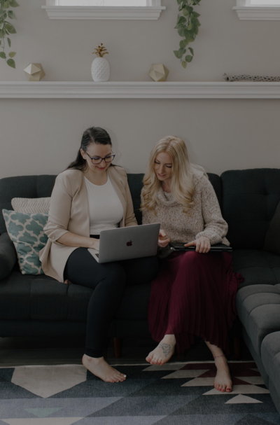 Discover how our Canadian virtual assistants can support your business. Image shows a professional working at a table, highlighting the efficiency and dedication of our virtual assistant team. Photo by Brooke Cagle on Unsplash.