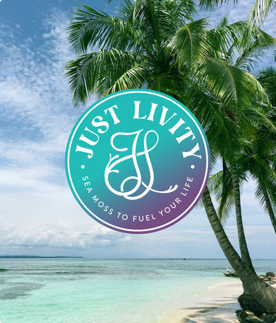 Round badge of Just Livity logo that sits on top of a tropical beach with a palm tree.