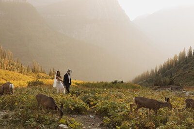 Groom seeing his bride for the first time during their Georgia wedding first look in the mountains.