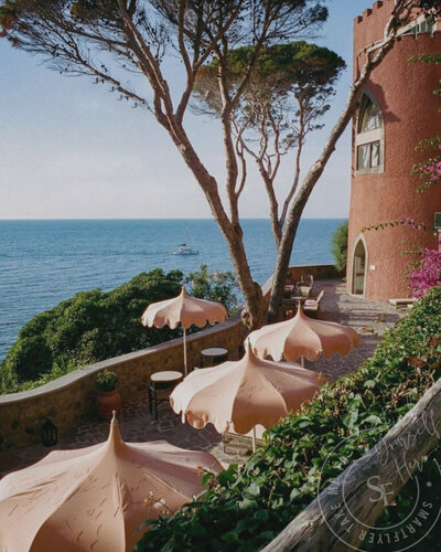 The luxurious Mezzatorre Hotel & Thermal Spa in Ischia, Italy, perched on a cliffside with panoramic sea views, offering an exclusive wellness retreat in the heart of the Mediterranean.