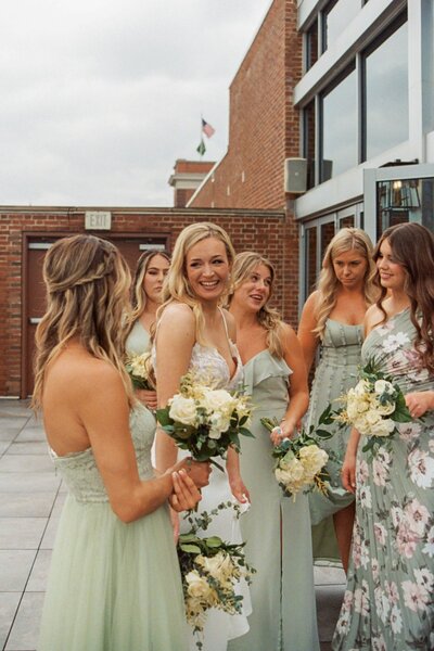 bride with her bridesmaids