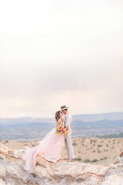 Bride and groom on mountian