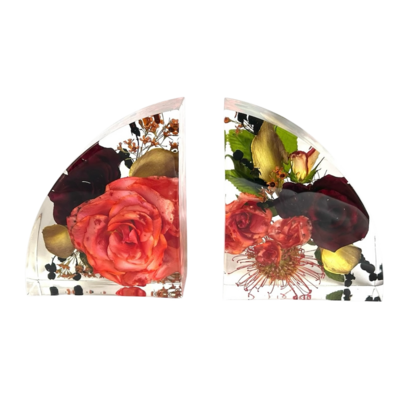 bright wedding flowers perfectly preserved in book end resin blocks 
