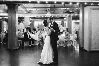 bride and groom during their first dance at black swan mke in downtown milwaukee wisconsin