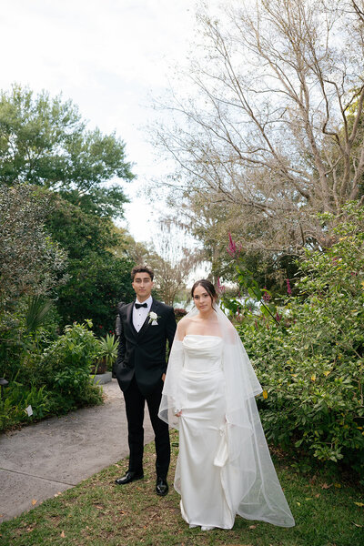 married couple looking at the camera
