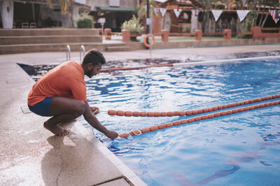 Aquatic facility maintenance in Virginia Beach being done by a man