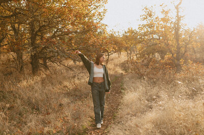 girl standing in field in Oregon
