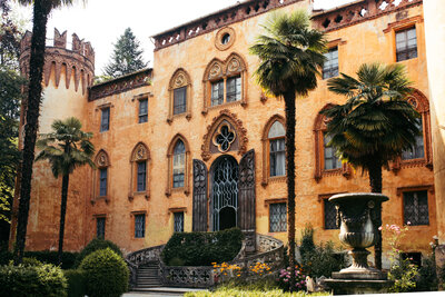 A stunning view of the exquisite Italian wedding venue, Castello del Roccolo, capturing the historic charm and picturesque surroundings that make it a truly beautiful setting for weddings