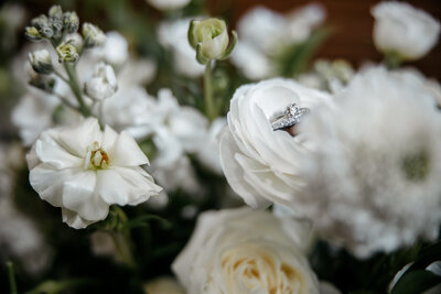 This breathtaking wedding at AllSaints Event Venue blends organic elements with modern, high fashion influences. Captured by Danielle Meredith Photography, the couple's chic style is evident in every detail, from the elegant floral arrangements to the sophisticated attire. The venue's contemporary design provides a stunning backdrop for the ceremony and reception, creating a seamless blend of natural beauty and high-end fashion. Keywords: organic wedding, modern wedding, high fashion wedding, AllSaints Event Venue, Danielle Meredith Photography, wedding photography, elegant wedding, contemporary wedding design.