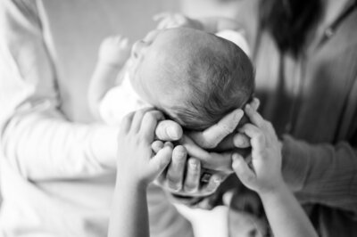 LIfestyle newborn and family portrait photographer in Nashville
