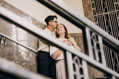 Engaged couple enjoying a romantic moment at Centennial Park in Nashville, TN