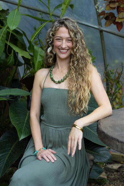 Dr. Mamie Burruss, ND, LAc, smiling outside in California
