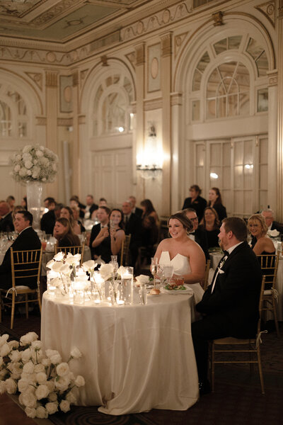 Bride and groom during toasts at their wedding at the Brown Hotel in Louisville, KY