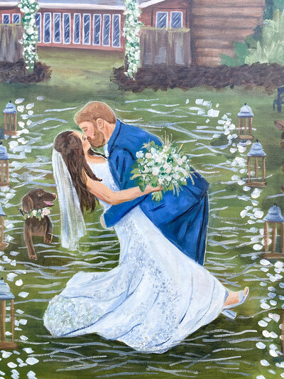 A custom live wedding painting by E Stokes Creations featuring a romantic outdoor ceremony at a rustic barn venue. The bride and groom share a kiss in the aisle surrounded by wooden benches, lush greenery, and white floral decorations. A brown dog stands nearby, adding a personal touch to the beautiful scene.