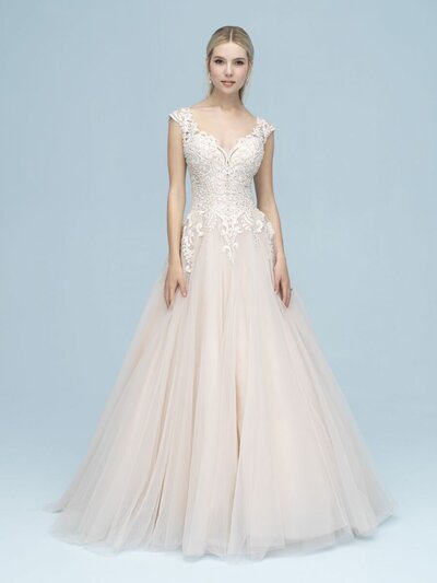 An appliqued, beaded bodice is paired with a classic tulle ballgown.