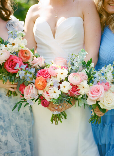 Bride and groom with bouquet on wedding day photographed by Baltimore Wedding Photographer