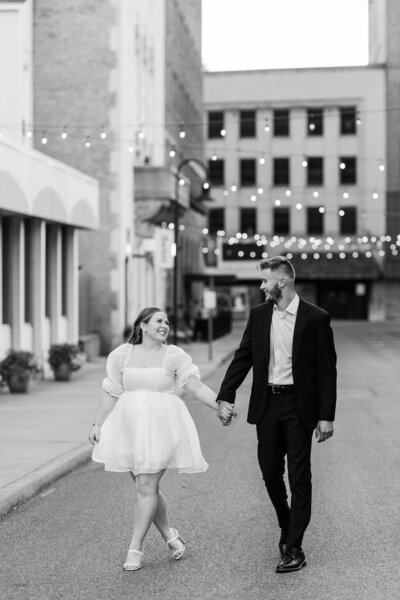 Bride and groom walk up memorial steps at their DC wedding